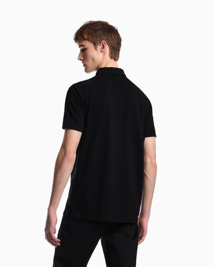 Polo shirt in piqué with partial zip