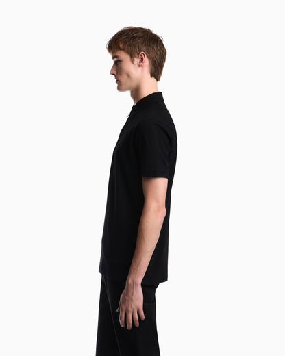 Polo shirt in piqué with partial zip