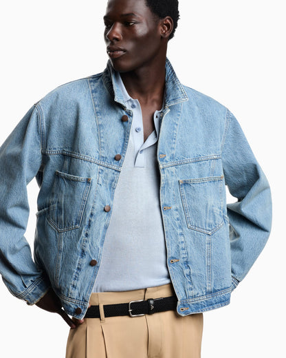 Blouson jacket in stone washed denim with metal buttons