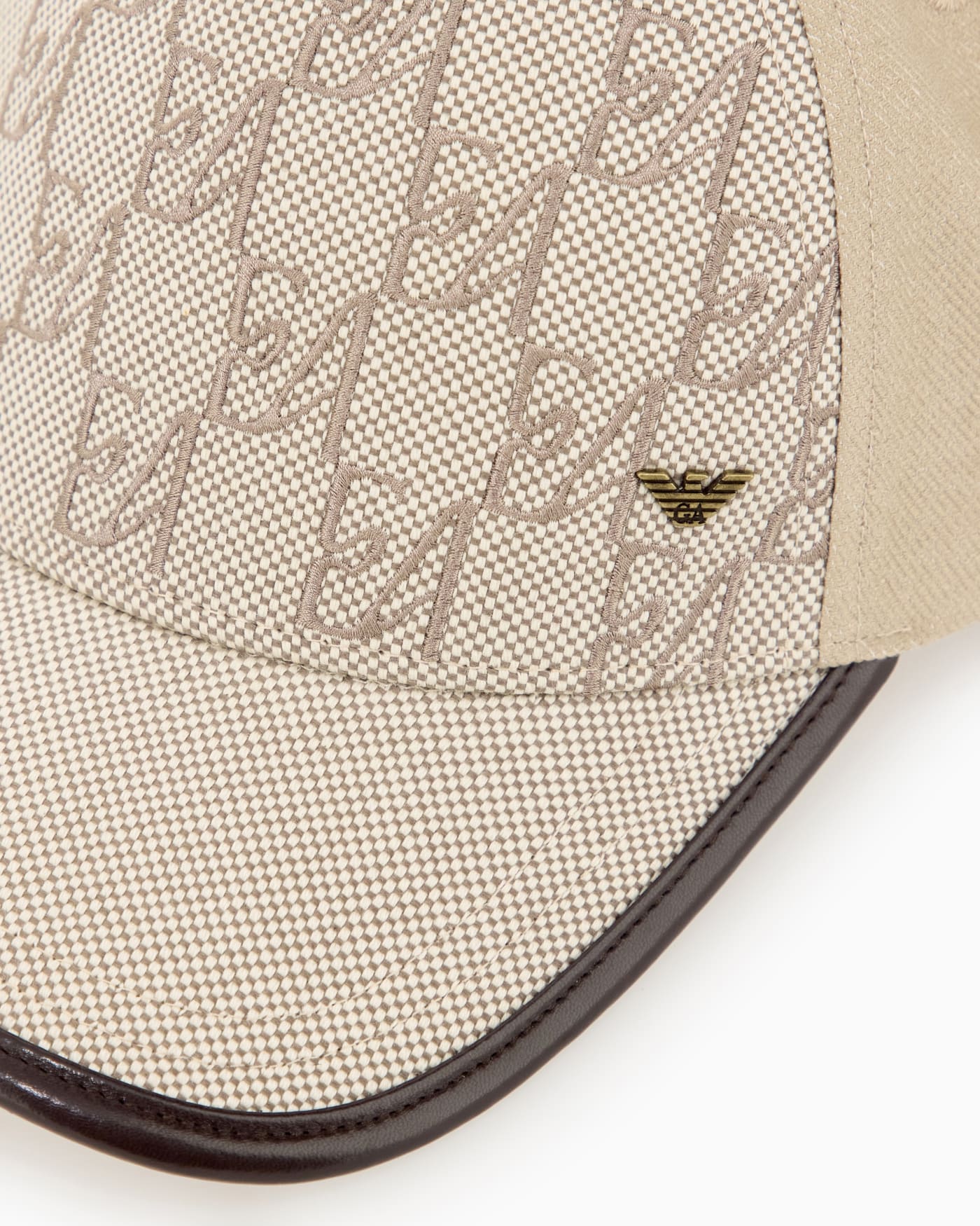 Baseball hat with a monogram pattern and adjustable strap