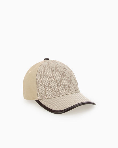 Baseball hat with a monogram pattern and adjustable strap