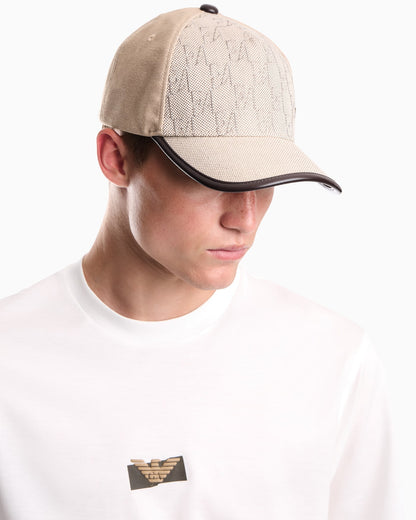 Baseball hat with a monogram pattern and adjustable strap