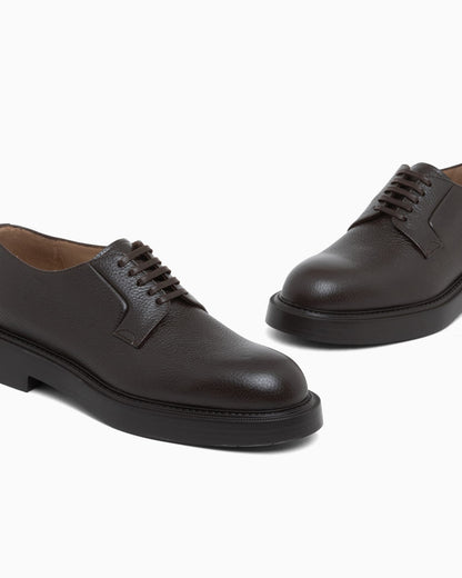Lace-up shoes in grained leather with a rubber sole