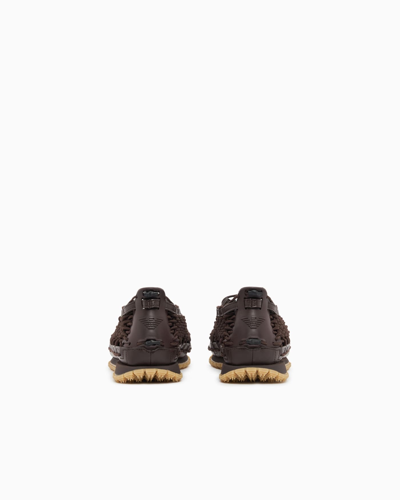 Sneakers with woven design and rugged rubber sole