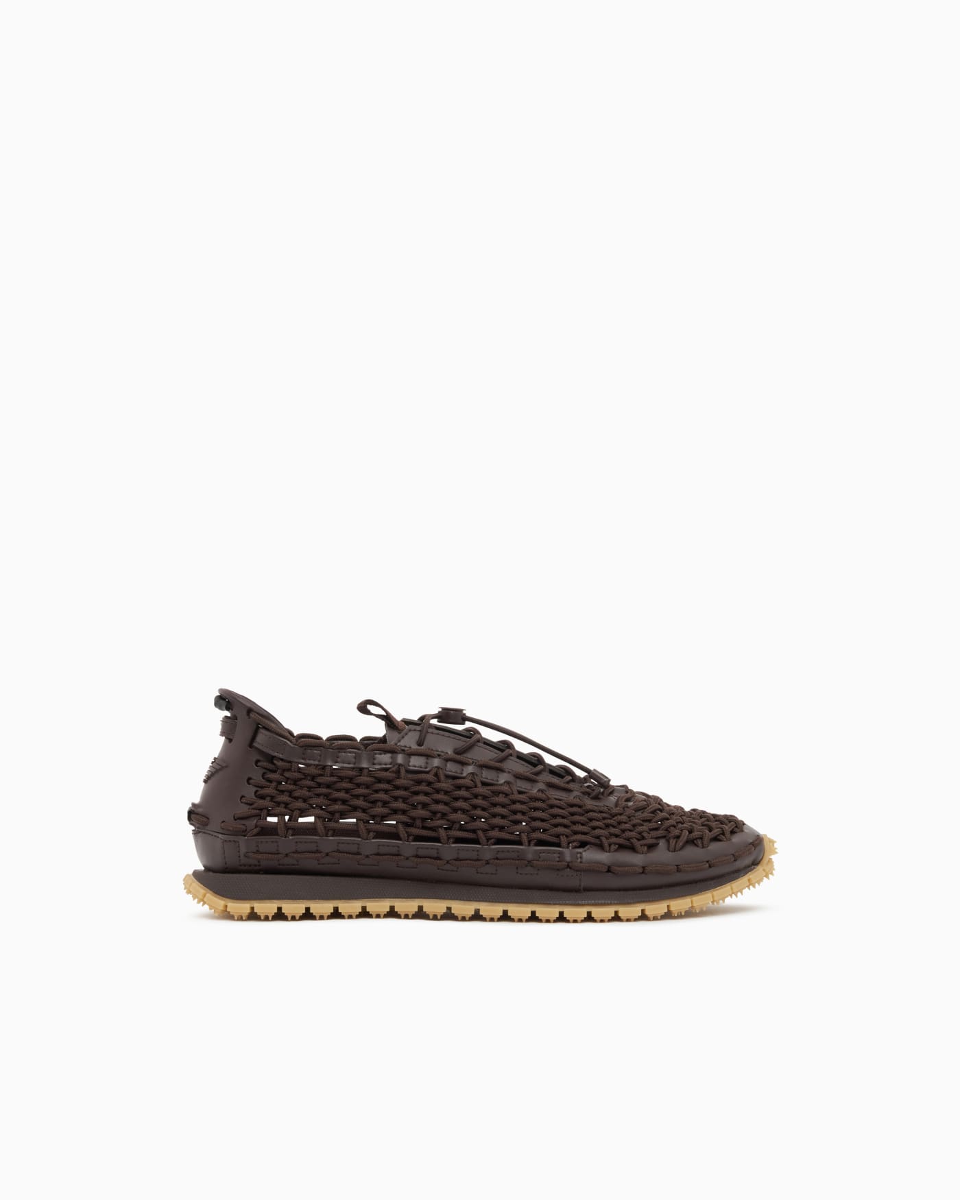 Sneakers with woven design and rugged rubber sole