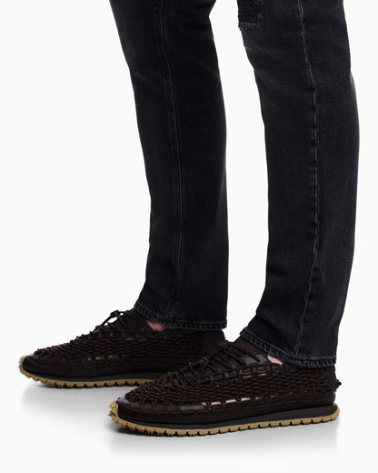 Sneakers with woven design and rugged rubber sole