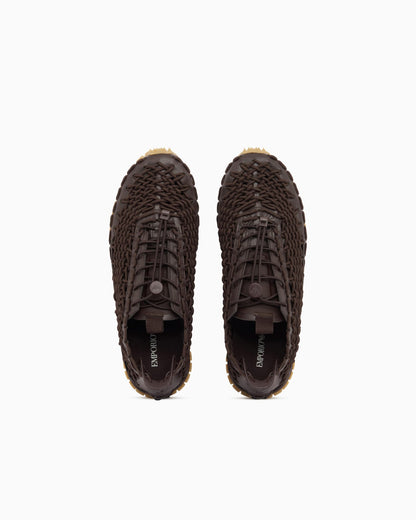 Sneakers with woven design and rugged rubber sole