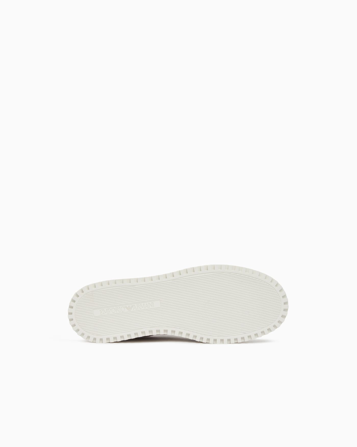Sneakers in canvas and leather with an all-over logo pattern