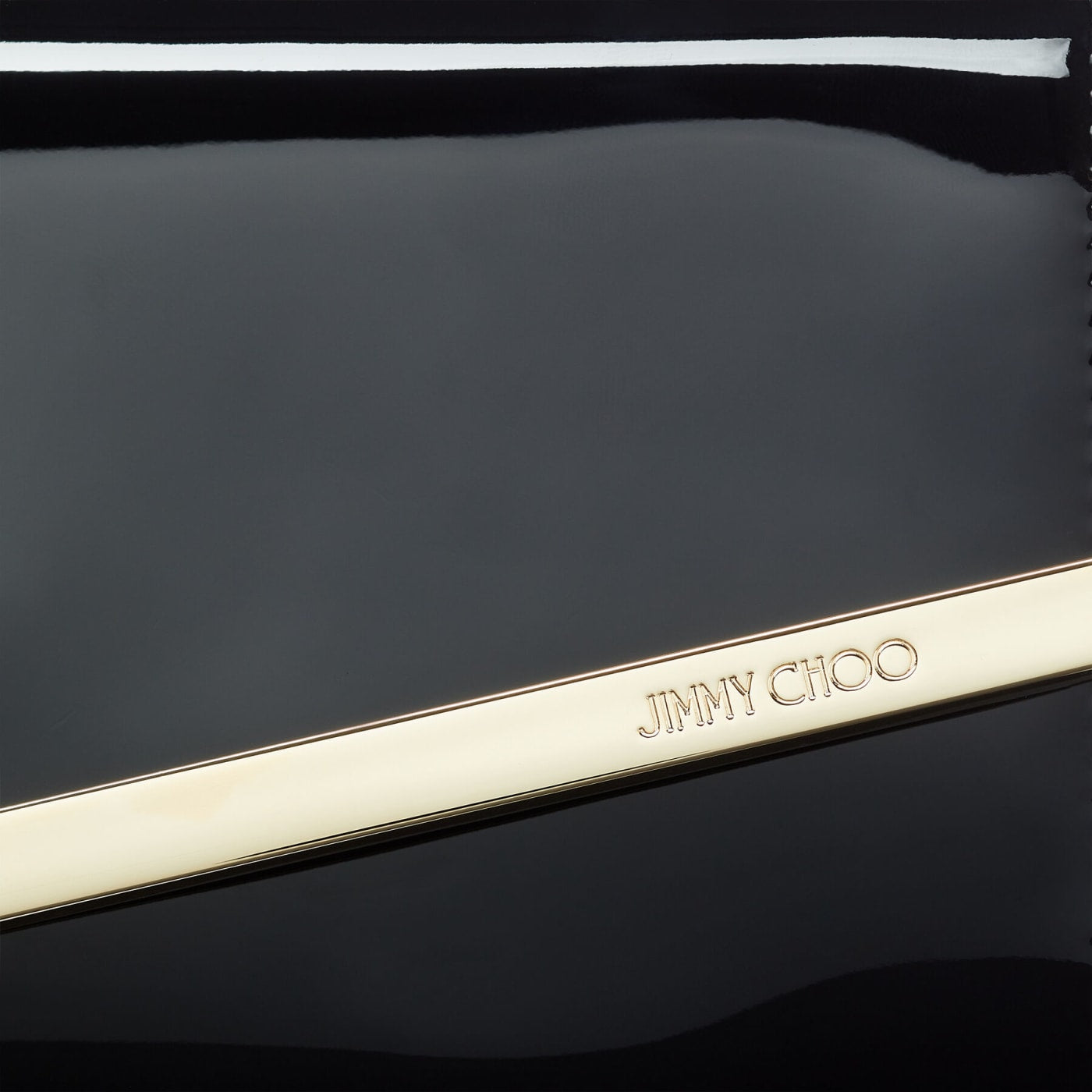 Emmie Black Patent Leather Clutch Bag