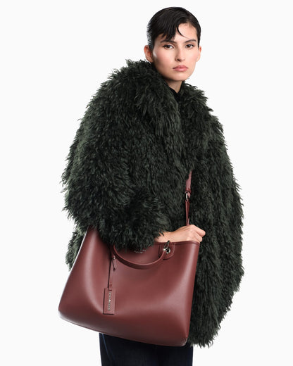 Shopping bag with a pebbled texture and dual top handles