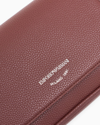 Wallet on chain with pebbled texture and adjustable strap