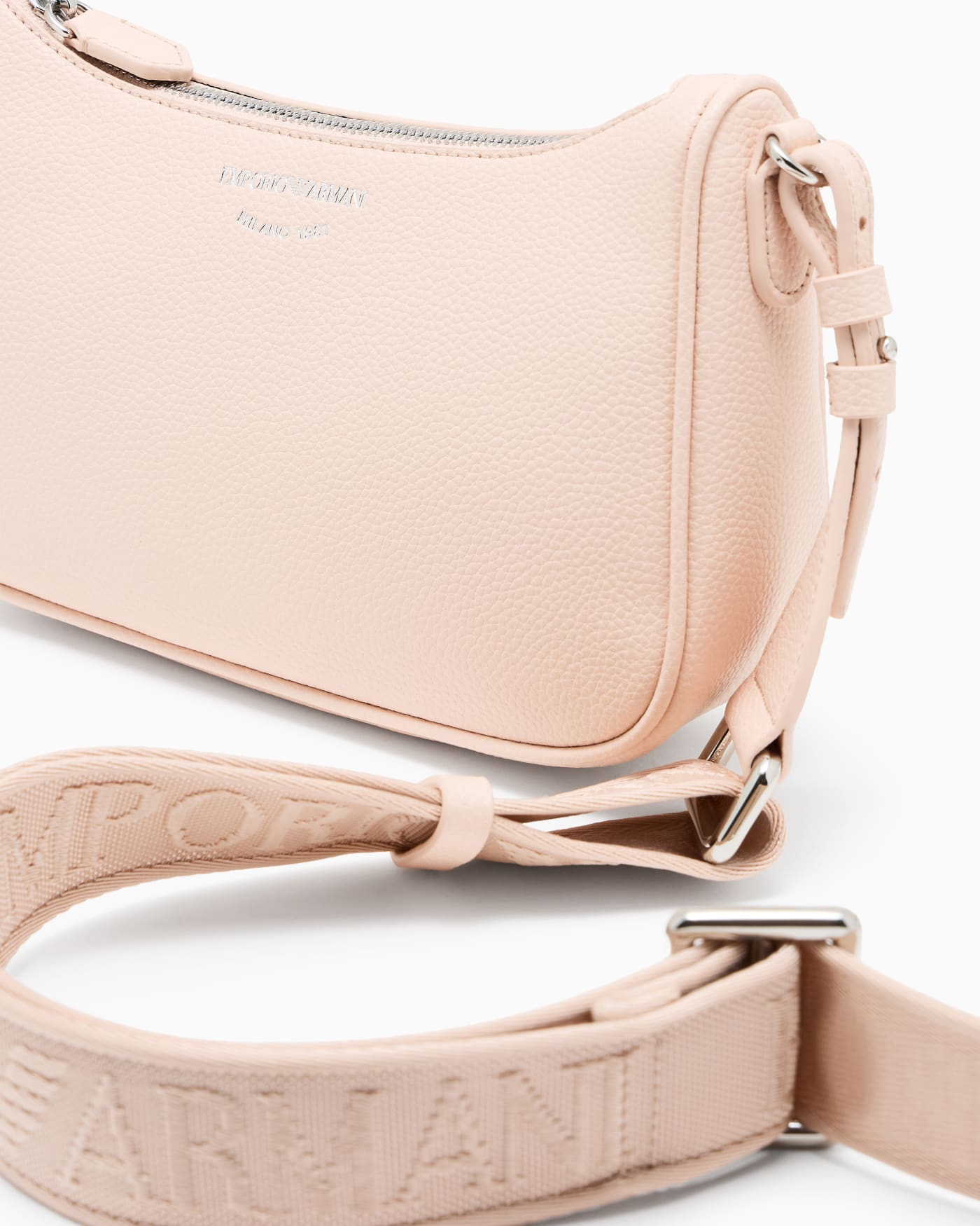Pebbled shoulder bag with a zip closure and adjustable strap