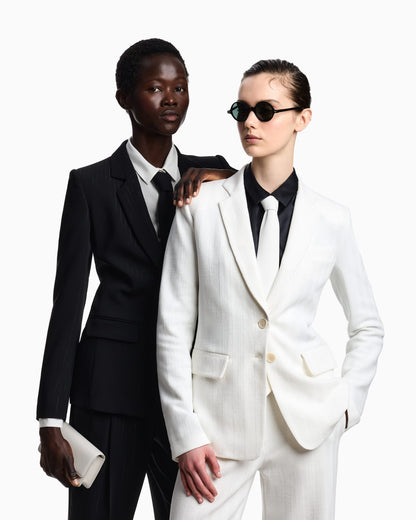 Trousers with pleats with a lurex pinstriped motif