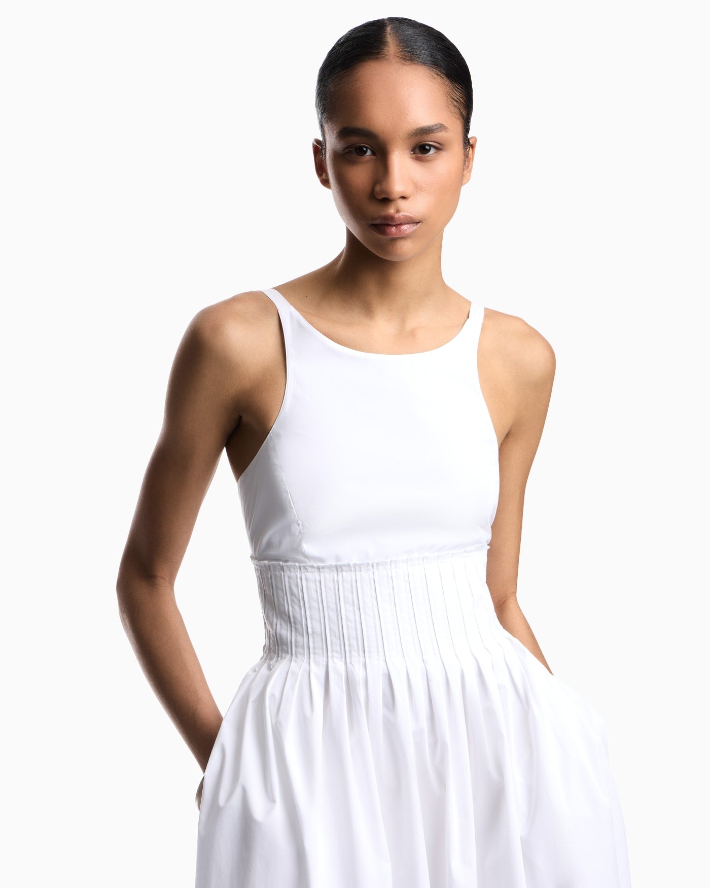 Long dress in poplin with smocked motif