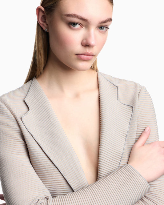 Jacket with lapels in canneté fabric
