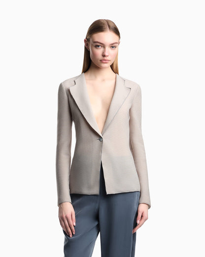 Jacket with lapels in canneté fabric