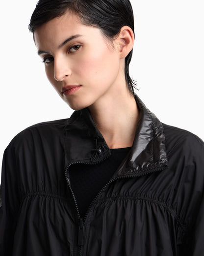 Reversible blouson jacket with matte and shiny finishes