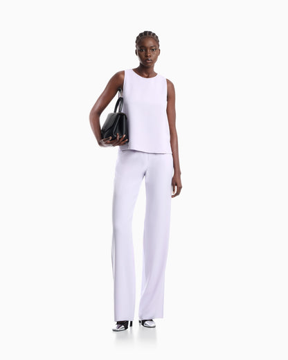 Textured sleeveless top with round neckline and back zip