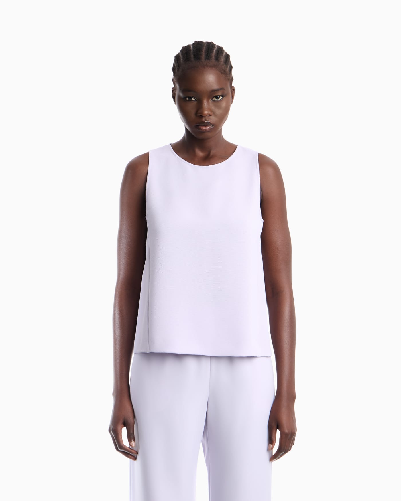 Textured sleeveless top with round neckline and back zip