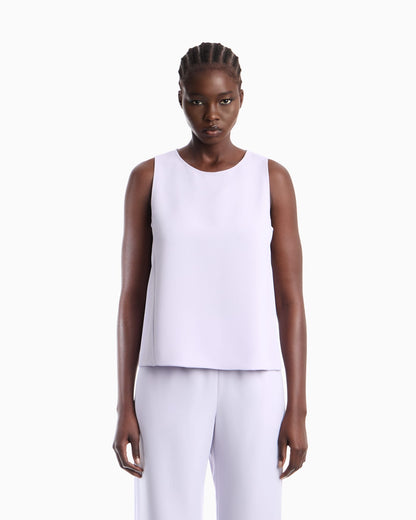 Textured sleeveless top with round neckline and back zip