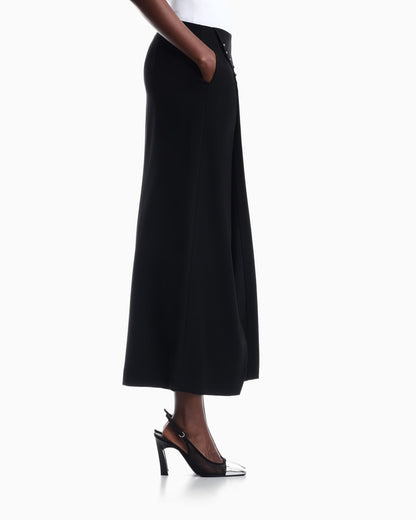 Unlined wrap skirt in techno cady with metallic buttons