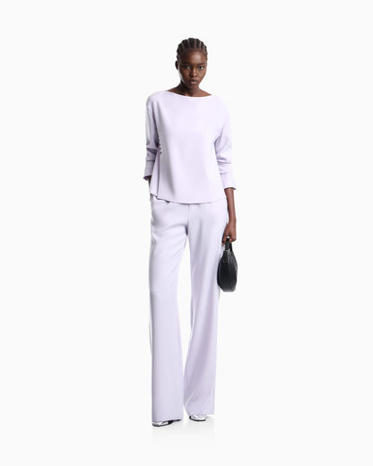Unlined top in techno cady with stud rivets and buttonholes
