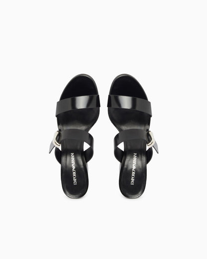 Shiny polished leather sandals with heel