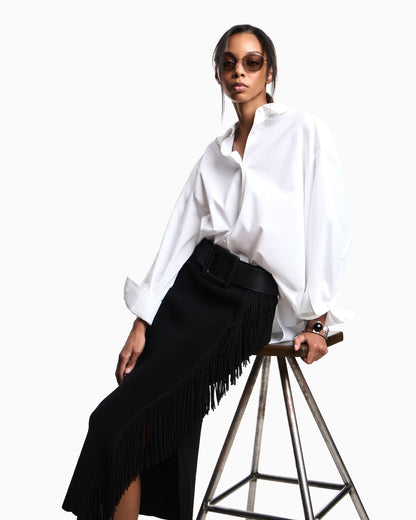 High-waisted viscose skirt with a slit and side fringe