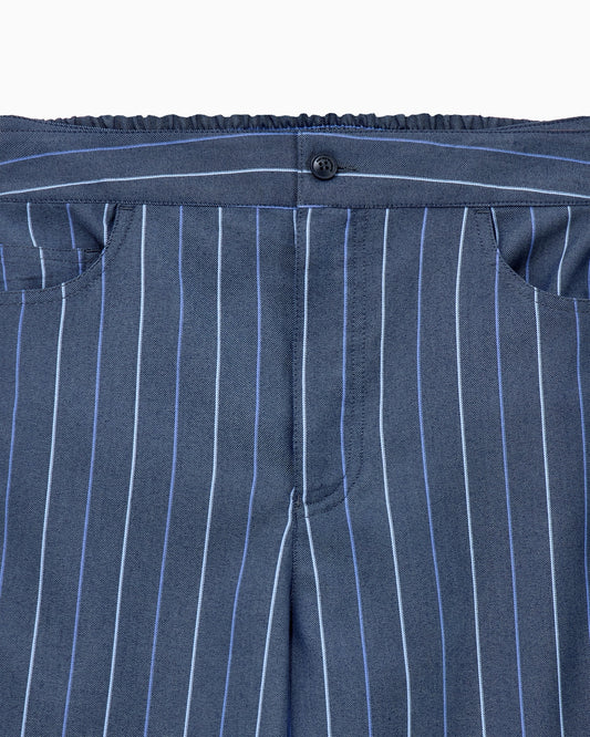 Trousers in jacquard striped denim with a wide leg