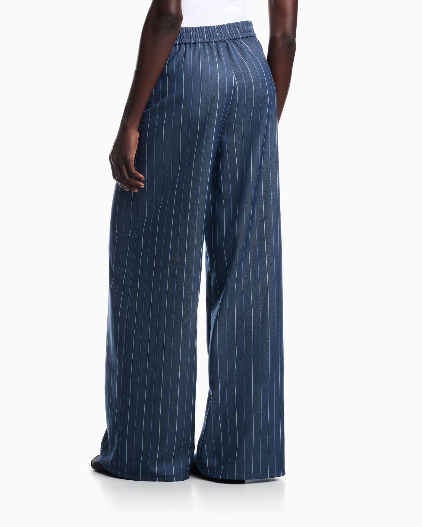 Trousers in jacquard striped denim with a wide leg
