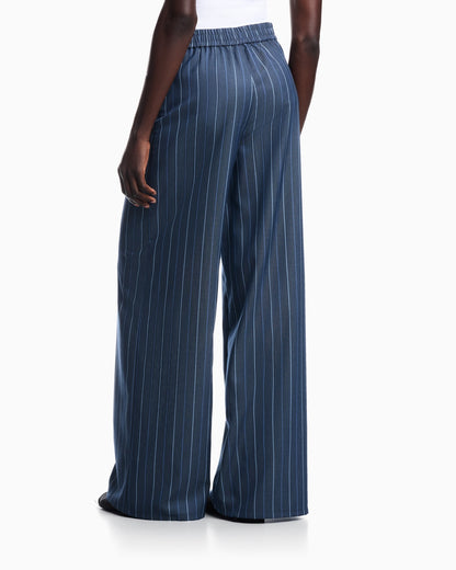Trousers in jacquard striped denim with a wide leg