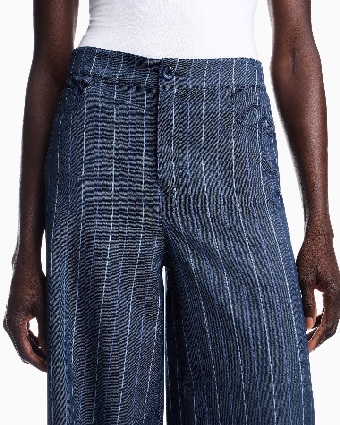 Trousers in jacquard striped denim with a wide leg