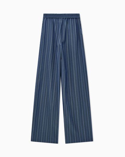 Trousers in jacquard striped denim with a wide leg