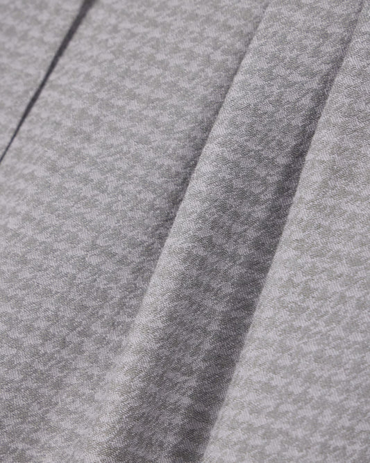 High-waisted trousers in houndstooth viscose and wool