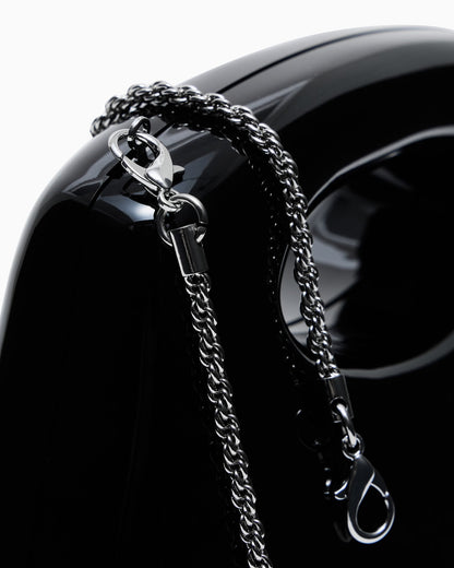 Shiny PVC clutch bag with shoulder strap