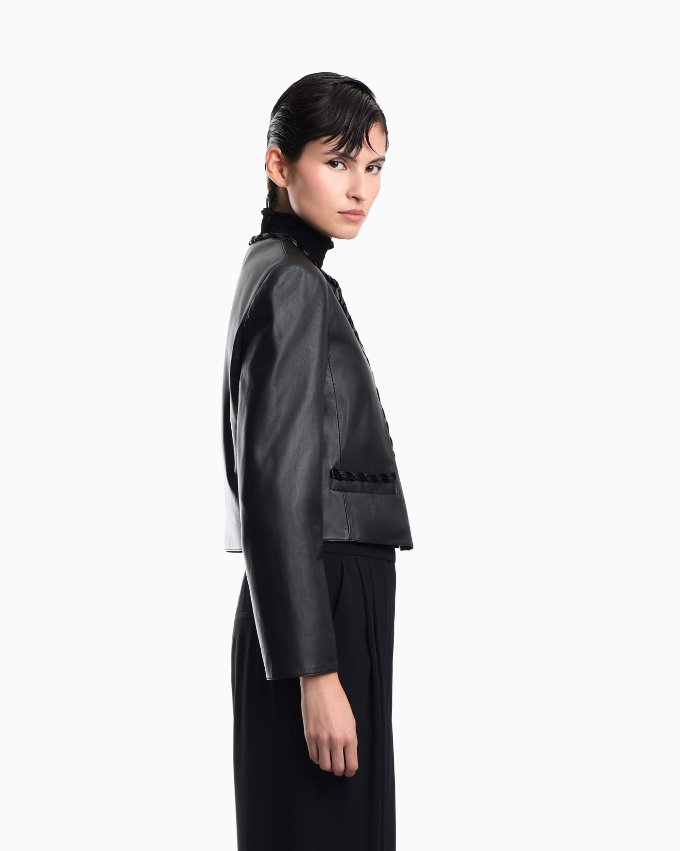 Cropped leather jacket with braided trim and button closure