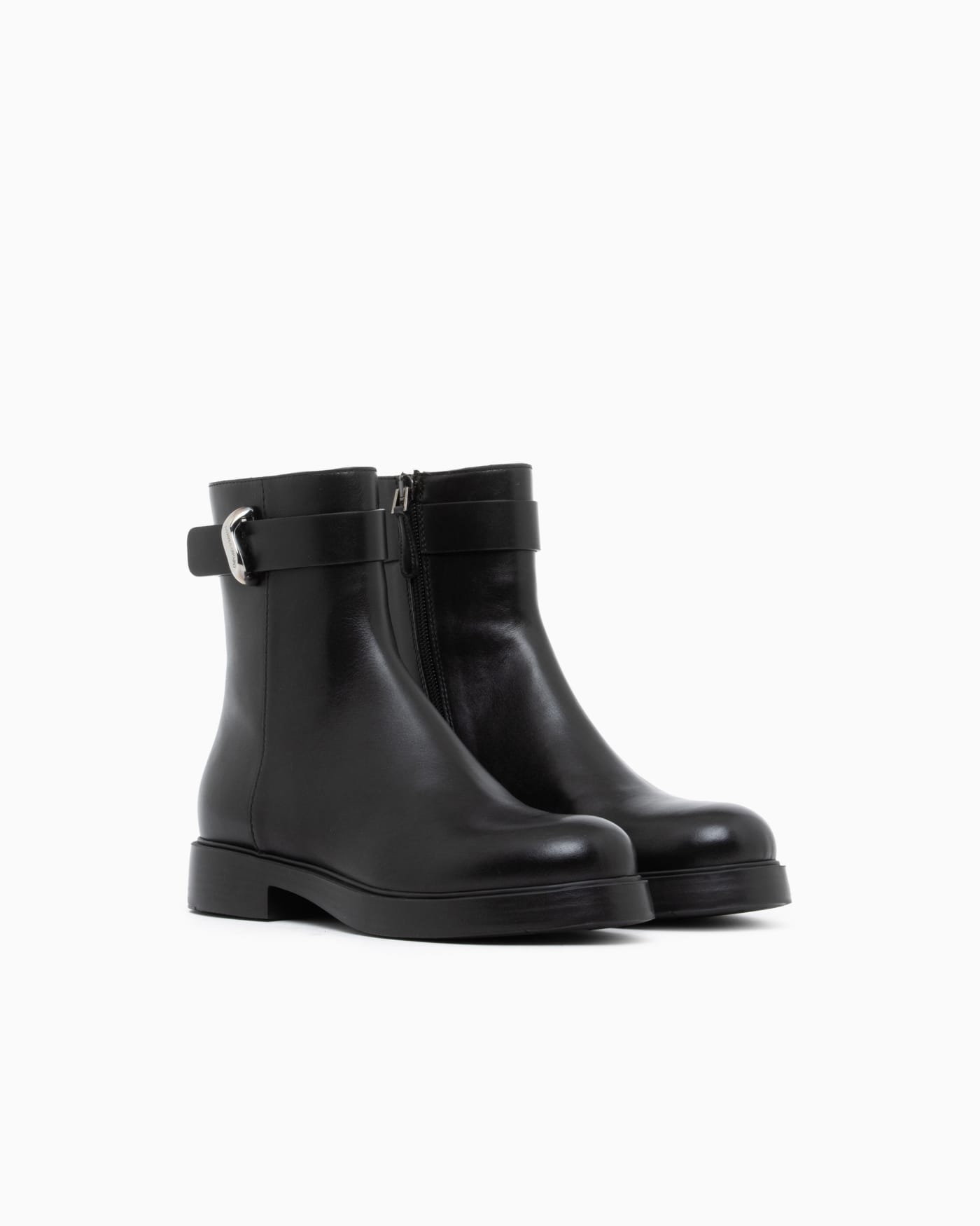 Leather ankle boots with side zip and buckled strap