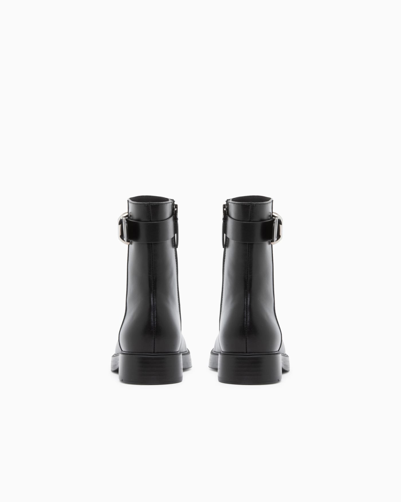 Leather ankle boots with side zip and buckled strap