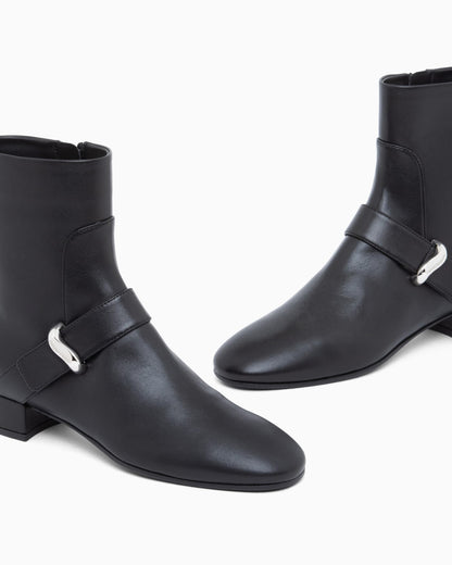 Nappa leather ankle boots with a side zip and metal buckle