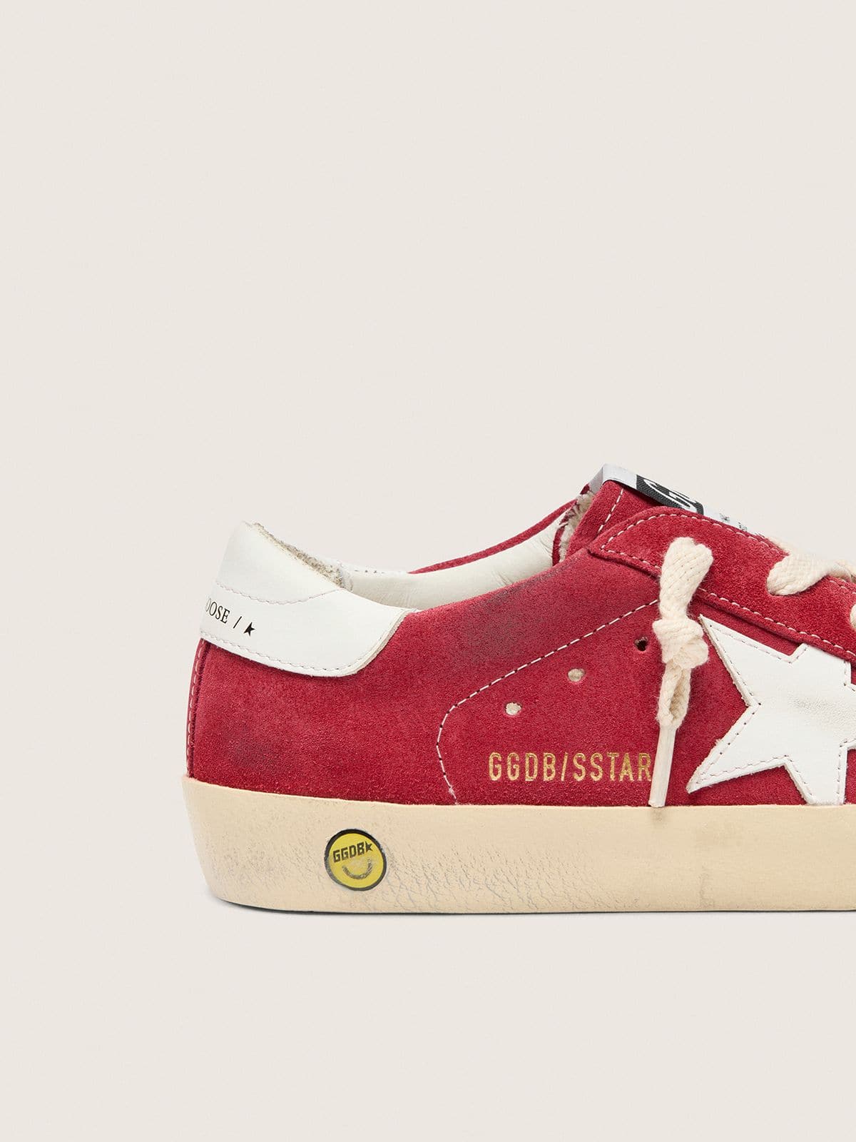 Junior Super-Star in red suede with white leather star and heel tab