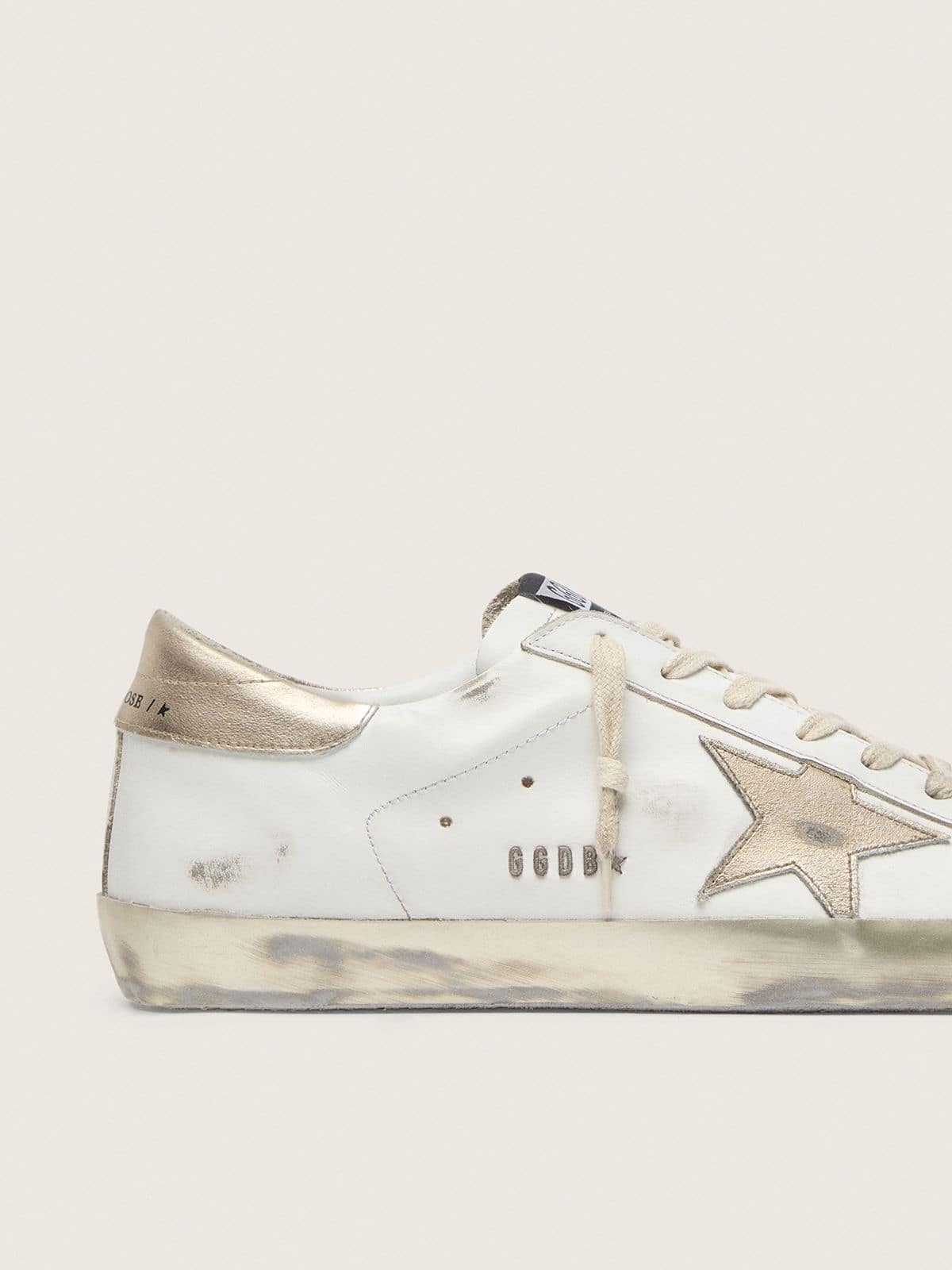 Men's Super-Star with gold sparkle foxing and lettering