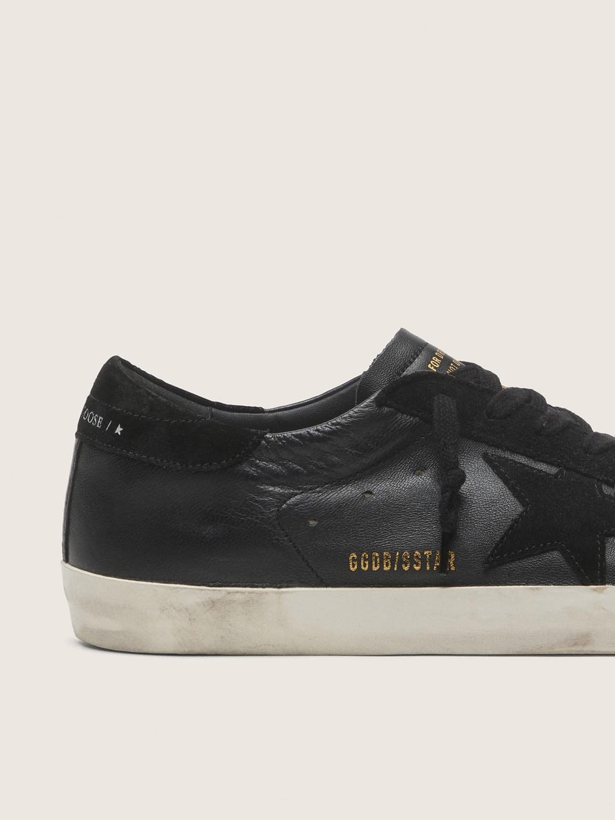 Men's Super-Star in black nappa with black suede star and heel tab