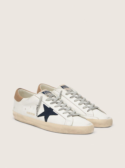 Men's Super-Star in white leather with midnight-blue canvas star and tobacco leather heel tab