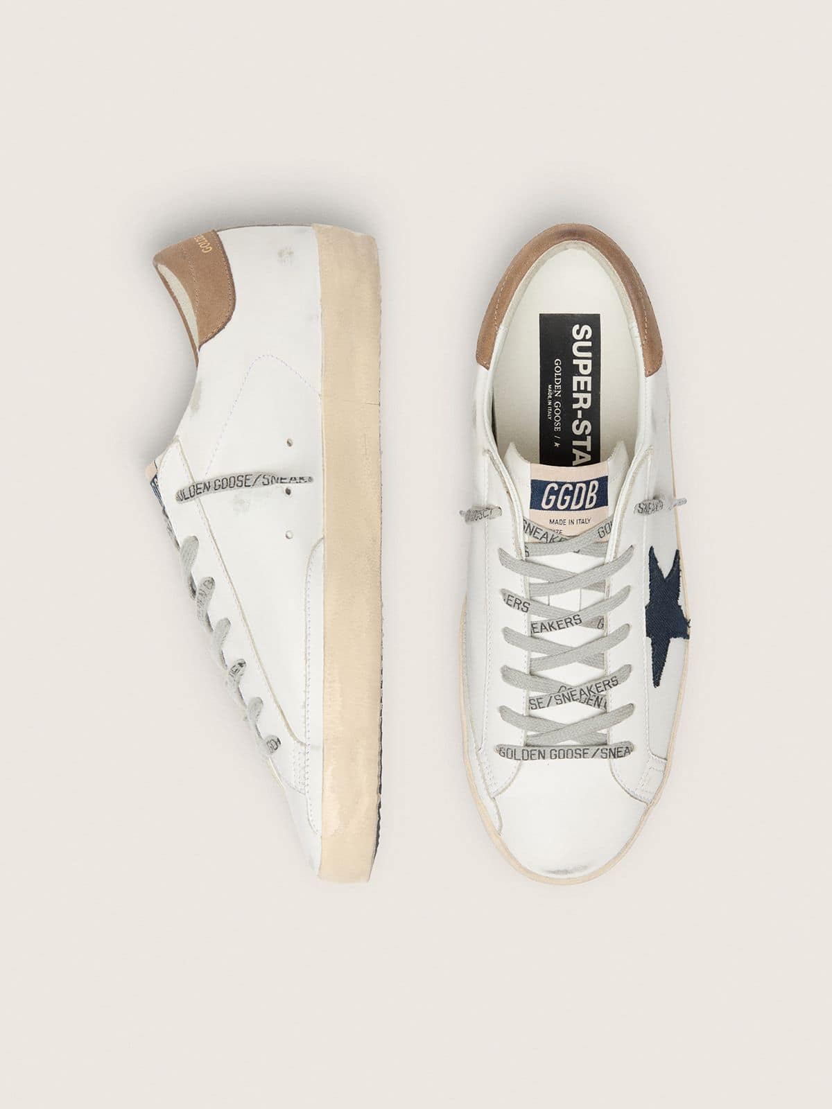 Men's Super-Star in white leather with midnight-blue canvas star and tobacco leather heel tab
