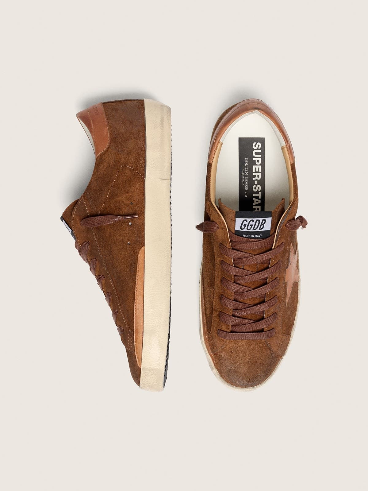 Men’s Super-Star LTD in brown suede with brick-red leather star and embroidery with green beads