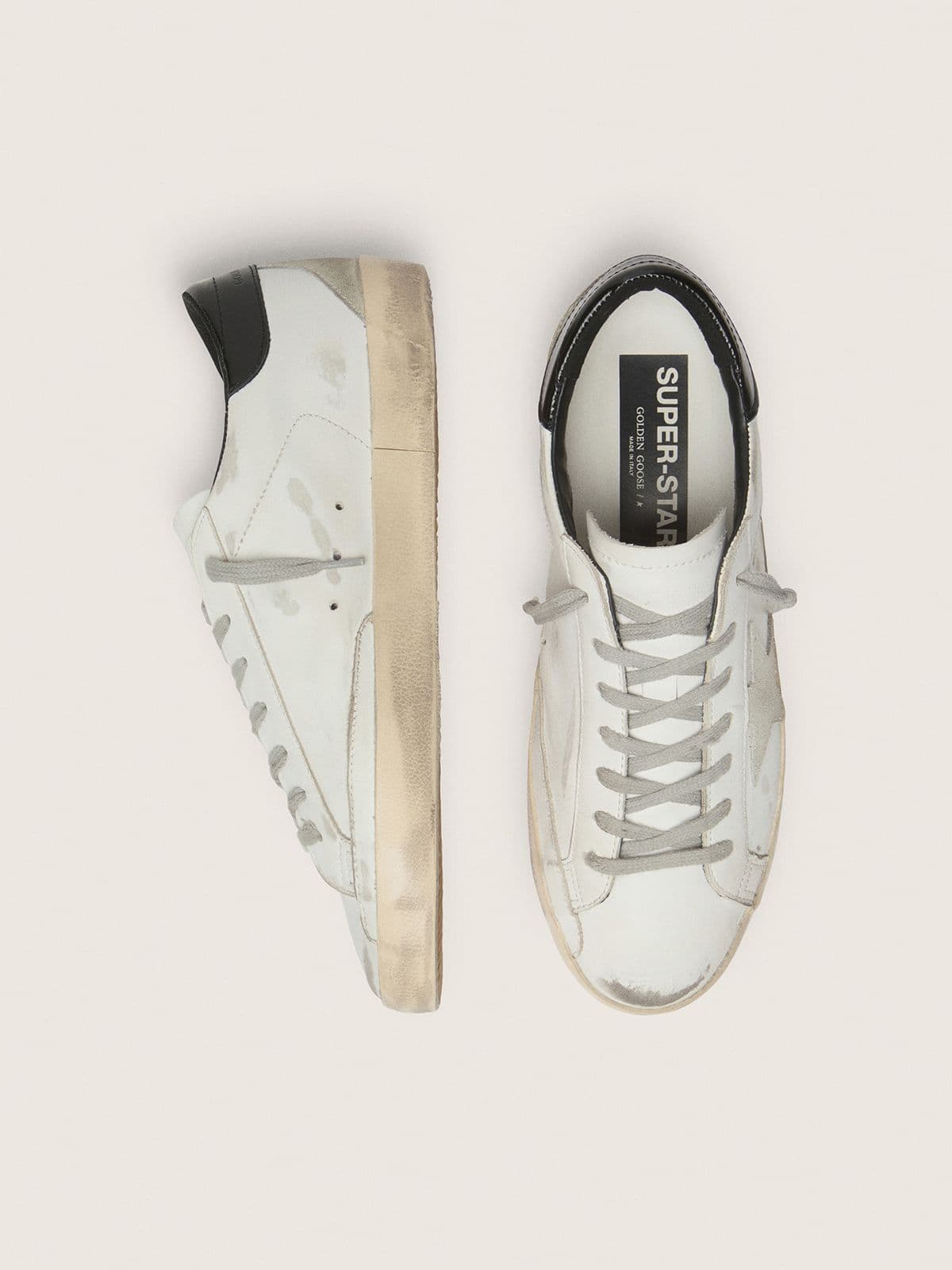 Men's Super-Star with black heel tab and metal stud lettering
