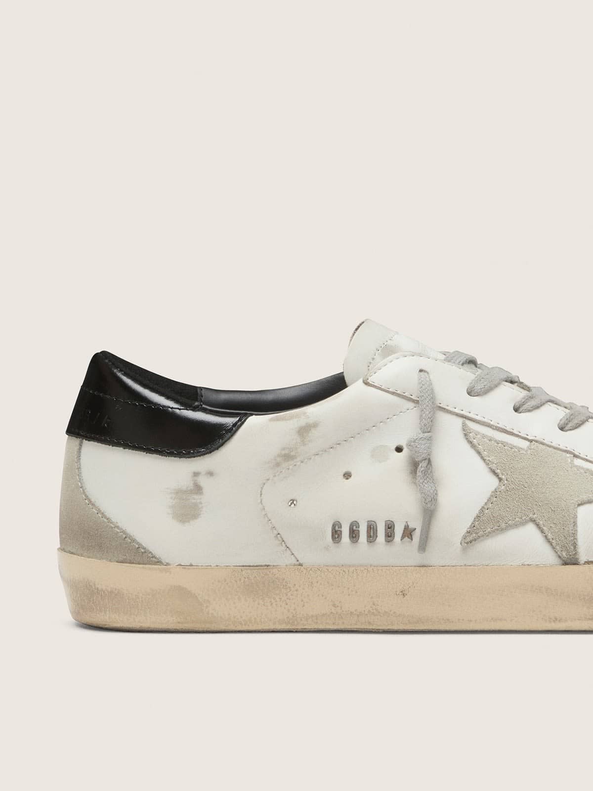 Men's Super-Star with black heel tab and metal stud lettering