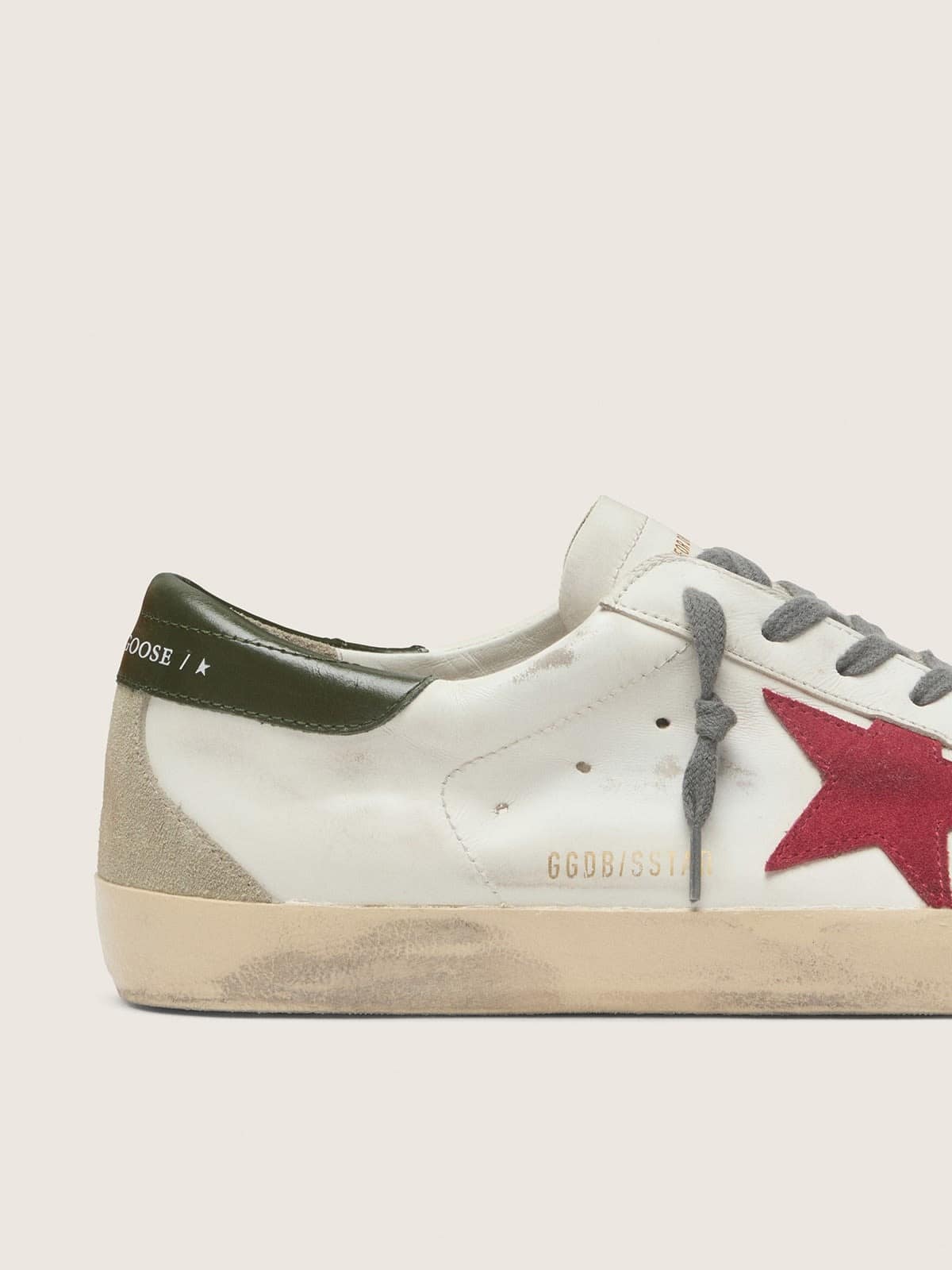 Men's Super-Star with red suede star and green leather heel tab