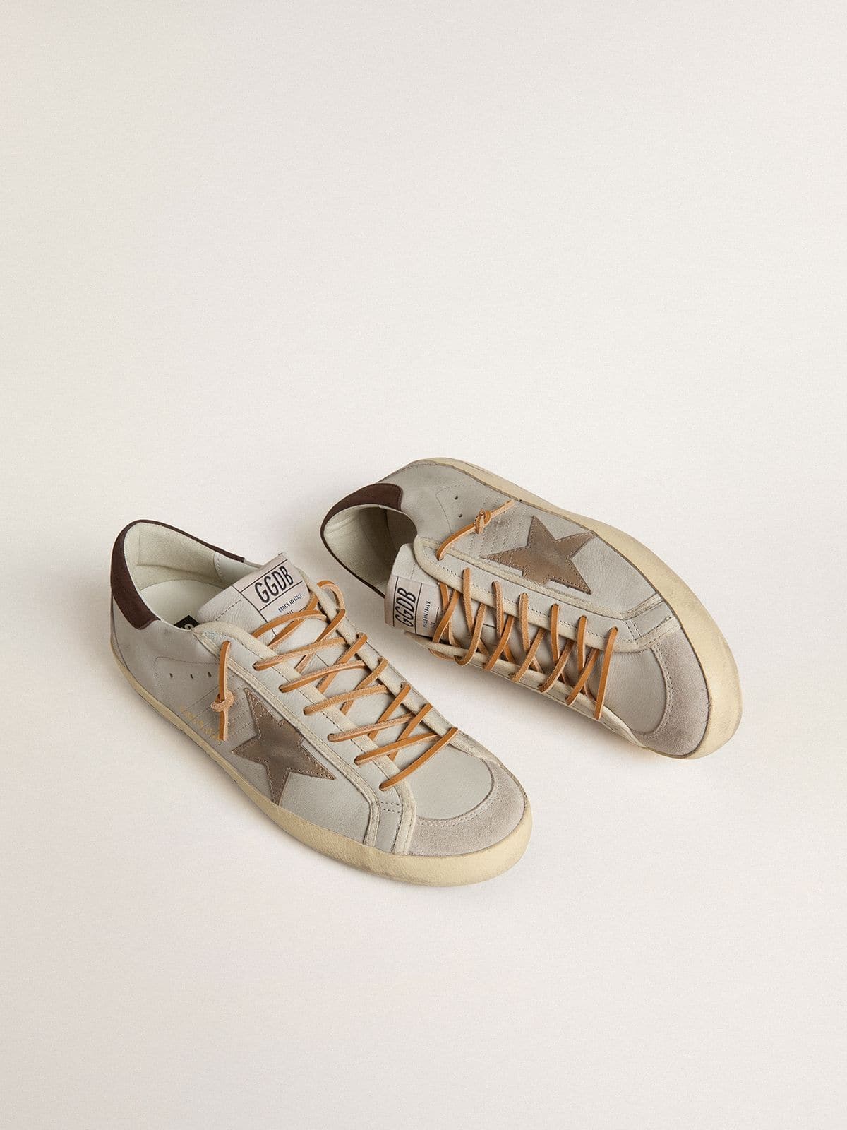 Men's Super-Star with tobacco-colored croc-print leather star and black leather heel tab
