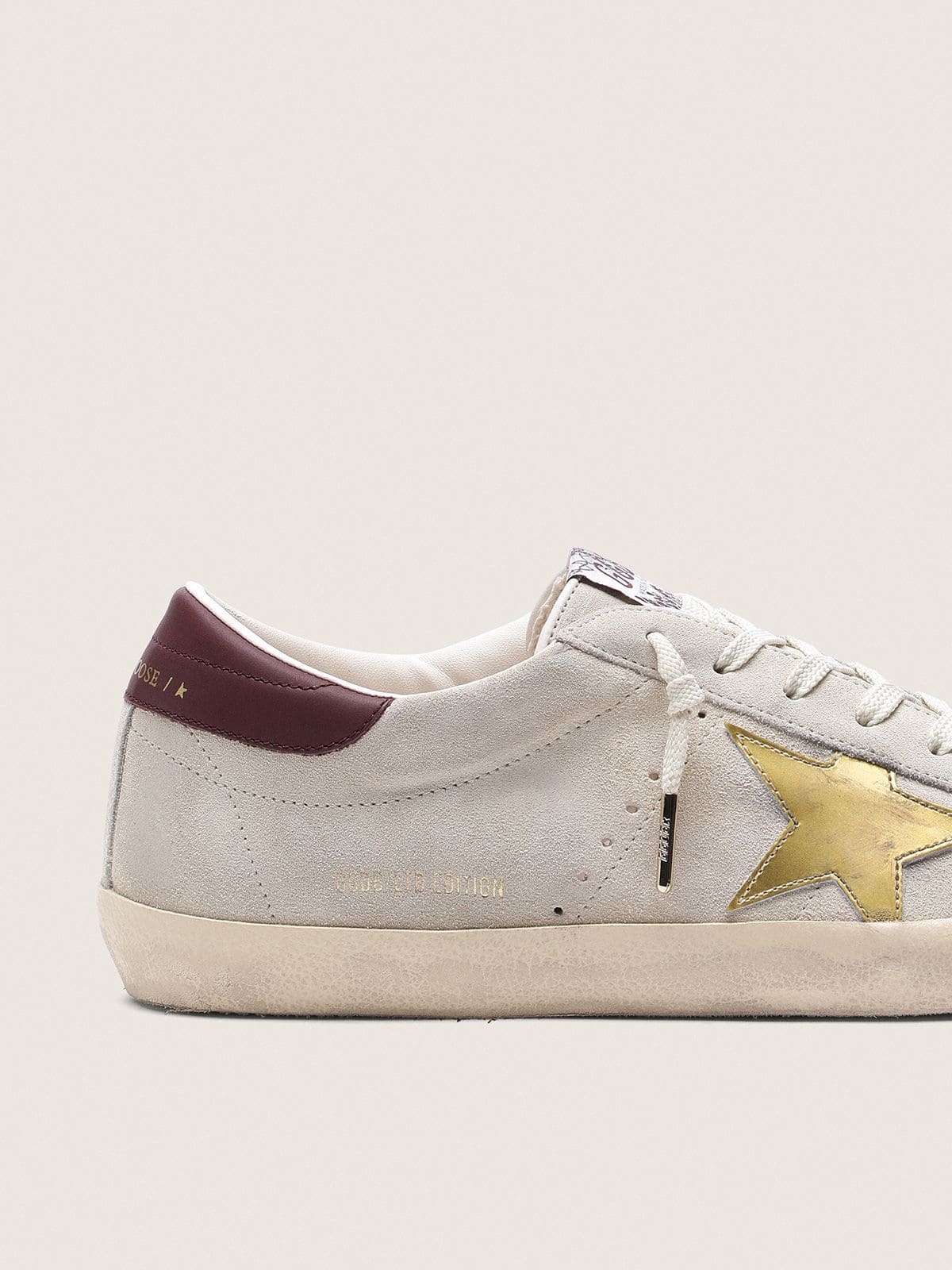 Men's Super-Star CNY in ivory suede with metallic leather star and leather heel tab